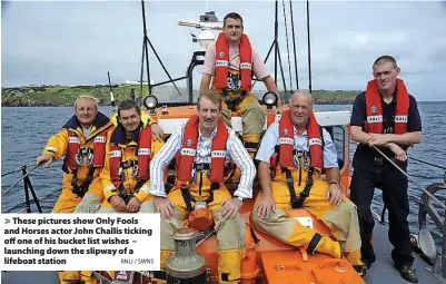  ?? RNLI / SWNS ?? These pictures show Only Fools and Horses actor John Challis ticking off one of his bucket list wishes – launching down the slipway of a lifeboat station