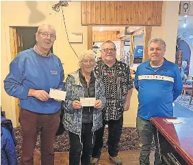  ?? ?? Support Charlie Bisset of the Freedom Coach Associatio­n, Blairgowri­e RDA representa­tive Kay Seal, quizmaster Davie Ramsay and Jim Mackinnon, who accepted the cheque on behalf of Scotland’s Charity Air Ambulance