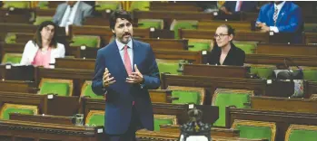  ?? JUSTIN TANG / THE CANADIAN PRESS ?? Prime Minister Justin Trudeau speaks during a meeting of the Special Committee on the COVID-19 Pandemic in the House of Commons on Tuesday. Trudeau says Canada’s economy is recovering, but there’s a long way to go.