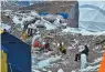  ??  ?? Expedition team members gather at Everest base camp, in Nepal on May 1