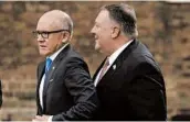  ?? MATT DUNHAM/AP ?? U.S. Ambassador Robert “Woody” Johnson, left, walks Tuesday with Secretary of State Mike Pompeo in London.