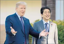  ?? Jim Watson AFP/Getty Images ?? PRESIDENT Trump, with Japanese Premier Shinzo Abe near Tokyo last year, in March announced a meeting with North Korea’s leader without alerting Abe.