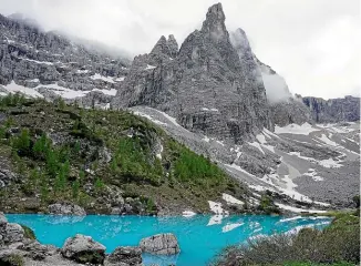  ??  ?? Lago di Sorapis – the emerald lake of Sorapis – is one of the most beautiful in the Dolomites.