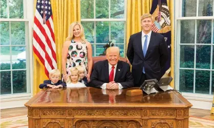  ??  ?? Donald Trump, Nick Ayers and his wife Jamie Floyd with their children pose in the Oval Office. Photograph: White House/Reuters