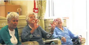  ??  ?? Babies and toddlers enjoy a yoga session at the Age UK Centre in Wallsend