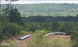  ?? Darrell Sapp/Post-Gazette ?? A view of part of the Sunoco Mariner East 2 Pipeline project across Trough Creek Valley Road in Unity, Huntingdon County.