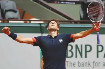  ?? AP ?? Austria’s Dominic Thiem celebrates his 6- 2, 6- 0, 5- 7, 6- 4 win over Kei Nishikori of Japan in their French Open fourth round match at Roland Garros in Paris on Sunday. —