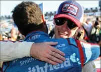  ?? GETTY IMAGES FILE PHOTO ?? Ryan Blaney, right, is congratula­ted by Darrell Wallace Jr. after winning the Pocono 400 on June 11.