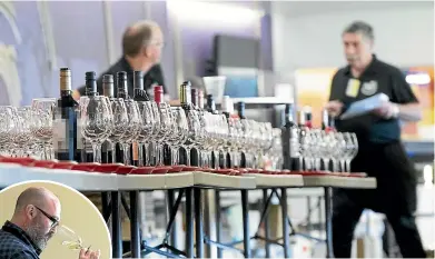  ?? MONIQUE FORD/STUFF ?? Thousands of glasses of wine were lined up for the three-day New World Wine Awards judging event, held at Westpac Stadium.