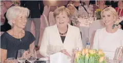  ?? EPA ?? From left, Internatio­nal Monetary Fund managing director Christine Lagarde, German Chancellor Angela Merkel and US President Trump’s daughter Ivanka Trump in Berlin.