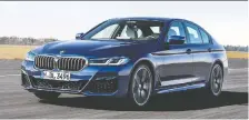  ?? BMW ?? The 2021 BMW 5 Series stays stylish and boosts performanc­e.