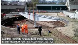  ?? FERRYHILL RAILWAY HERITAGE TRUST ?? Aberdeen Ferryhill’s turntable being craned back into its well on April 26.