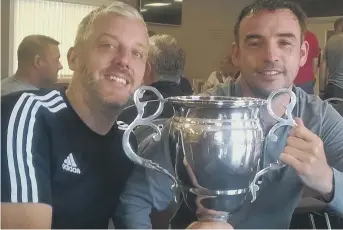  ??  ?? Penshaw players Kenny Taylor and Damian Maw with the Austin Elliott Charity Cup.