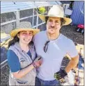  ?? EDUARDO CONTRERAS U-T ?? Kara and Mark Stambaugh pose for photos last week in front of the chicken coop at their La Mesa home.