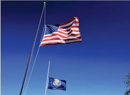  ??  ?? Flags fly at half- staff in honour of Arnold Palmer prior to the 2016 Ryder Cup at Hazeltine National Golf Club on Tuesday in Chaska, Minnesota ( USA).