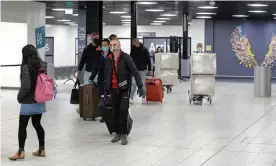  ?? Photograph: Christian Sinibaldi/The Guardian ?? Passengers arriving at Luton airport in the UK off a commercial flight.