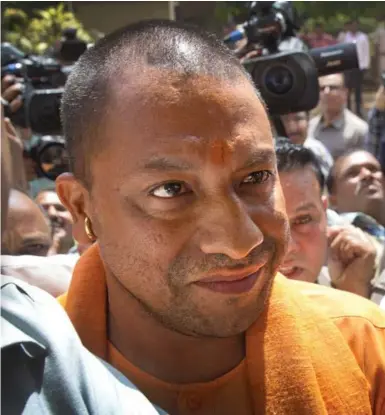 ?? MANISH SWARUP/THE ASSOCIATED PRESS ?? The new chief minister of the northern Indian state of Uttar Pradesh, Yogi Adityanath, is a hardline Hindu religious leader.