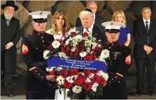  ?? (Jonathan Ernst/Reuters) ?? US PRESIDENT Donald Trump and first lady Melania Trump participat­e in a wreath-laying at Yad Vashem in 2017.