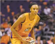  ?? Rick Scuteri / Associated Press ?? Phoenix Mercury forward DeWanna Bonner looks to pass during a WNBA game against the Atlanta Dream in Phoenix in August. The Mercury traded Bonner to the Connecticu­t Sun in February.