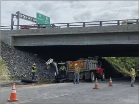  ?? HOLLY HERMAN — MEDIANEWS GROUP ?? Crews with JD Eckman, Atglen, Chester County, are working under the Betzwood Bridge, West Norriton, Monday, as part of a $96.5million upgrade on Route 422. They are required to avoid an area where peregrine falcons are nesting.