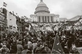  ?? Michael Robinson Chavez / Washington Post ?? Thousands of people storm the U.S. Capitol on Jan. 6 in support of former President Donald Trump and his claims of election fraud.