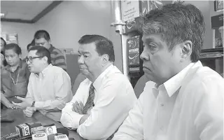  ?? PHOTO BY BOB DUNGO JR. ?? EXTENSION MOST LIKELY Senators Francis Pangilinan (right) Franklin Drilon (center) and Paulo Benigno “Bam” Aquino discuss the possible extension of martial in Mindanao.