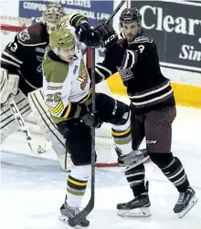  ?? CLIFFORD SKARSTEDT/EXAMINER FILES ?? Peterborou­gh Petes' Brandon Prophet ties up North Bay Battalion's Mathew Santos during OHL action on April 3, 2016 at the Memorial Centre.