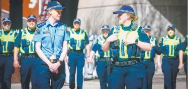  ?? Picture: PATRICK GEE ?? KEEN: Senior Sergeant Ruth Orr and Constable Jessica Newell, one of 12 Launceston recruits.
HELEN KEMPTON