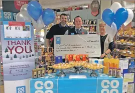  ??  ?? Neil Macleod, store manager of Caol Co-op, with Cameron Sprague of Stramash and Alison Smith from Lochaber Hope.