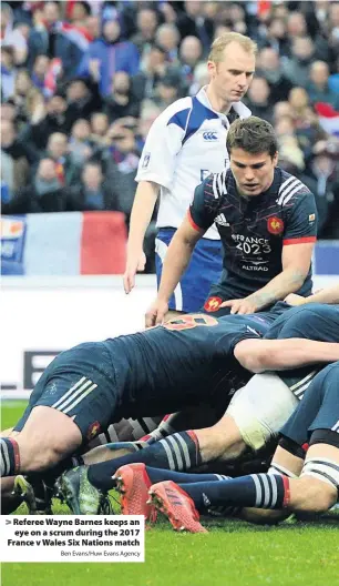  ?? Ben Evans/Huw Evans Agency ?? > Referee Wayne Barnes keeps an eye on a scrum during the 2017 France v Wales Six Nations match