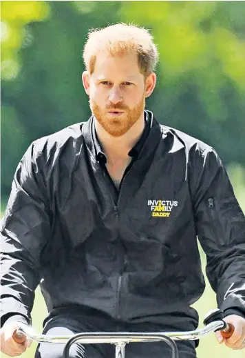  ??  ?? The Duke of Sussex wore an Invictus jacket with the message ‘I am daddy’ highlighte­d in yellow as he visited the Netherland­s to promote the Invictus Games. During the trip the Duke said that becoming a father had given him a new focus in life