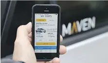  ?? PAUL SANCYA/THE ASSOCIATED PRESS ?? The Maven app is part of a General Motors car-sharing service.