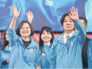  ?? AP ?? Taiwan President and Democratic Progressiv­e Party presidenti­al candidate Tsai Ing-wen, left, waves to supporters while launching her re-election campaign in Taipei on Sunday.