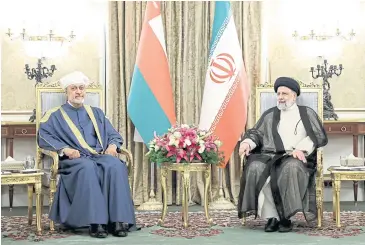  ?? REUTERS ?? Oman’s Sultan Haitham bin Tariq meets with Iranian President Ebrahim Raisi in Tehran on Sunday.