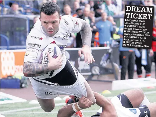  ?? Craig Galloway ?? Chris Bridge powers towards the try-line for Widnes Vikings in last season’s home clash with Castleford Tigers.