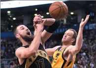  ?? CP PHOTO FRANK GUNN ?? Toronto Raptors centre Jonas Valanciuna­s (17) is fouled by Utah Jazz forward Joe Ingles (2) during second half NBA basketball action in Toronto on Friday.