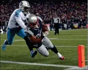  ?? ASSOCIATED PRESS ?? NEW ENGLAND PATRIOTS running back James White runs past Tennessee Titans safety Kevin Byard (31) for a touchdown during the first half of Saturday’s NFL divisional playoff game in Foxborough, Mass.