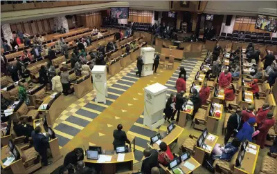  ?? PICTURE: AP ?? Members of Parliament prepare to vote for or against the motion of no confidence in President Jacob Zuma on Tuesday.