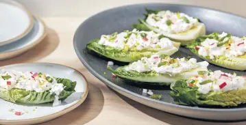  ?? TOM MCCORKLE For The Washington Post ?? Gem Lettuce Boats with Feta, Radish and Scallion are a deliciousl­y different way to eat fresh vegetables.