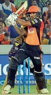  ??  ?? Shikhar Dhawan of Sunrisers Hyderabad in action against Kolkata Knight Riders in Hyderabad on Saturday. — Surendra Panishetty