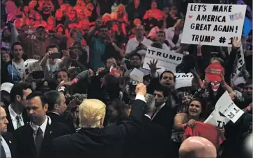  ?? Wally Skalij Los Angeles Times ?? DONALD TRUMP waves to a crowd at a campaign rally in Costa Mesa in April. After Trump’s election, his Golden State supporters formed the nonprofit Make California Great Again to continue supporting him.