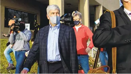  ?? CODY SCANLAN AP ?? Former Michigan Gov. Rick Snyder is seen after his video arraignmen­t on charges related to the Flint water crisis on Thursday.