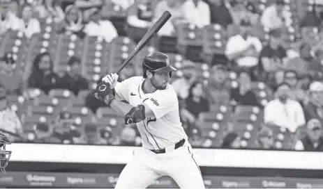  ?? BRIAN BRADSHAW SEVALD/USA TODAY SPORTS ?? Tigers outfielder Matt Vierling bats against the Rangers at Comerica Park on Monday night.