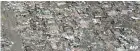  ??  ?? THIS AERIAL photo shows flattened houses in the city of Tacloban, Leyte province, in the central Philippine­s on Nov. 11, 2013, only days after Supertypho­on Haiyan devastated the town on Nov. 8.