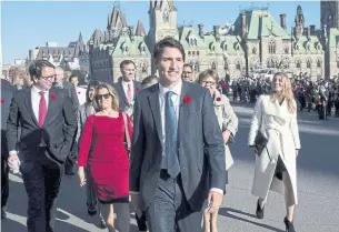  ?? JUSTIN TANG/THE CANADIAN PRESS FILE PHOTO ?? When asked why it was important to give half the cabinet posts to women, newly elected Prime Minister Justin Trudeau said: “Because it is 2015.” A self-styled feminist, Trudeau owes Canadians an explanatio­n of a groping allegation made against him 18...