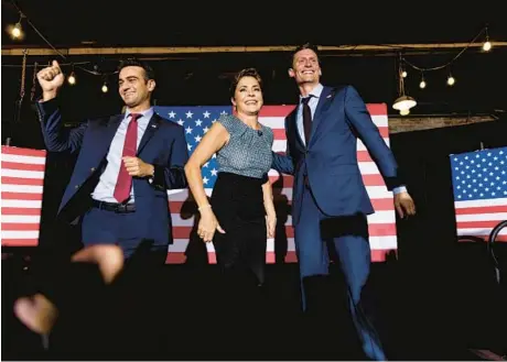  ?? ADRIANA ZEHBRAUSKA­S/THE NEW YORK TIMES ?? Abraham Hamadeh, from left, Kari Lake and Blake Masters, Republican­s running for Arizona attorney general, governor and Senate respective­ly, have all disputed the legitimacy of the 2020 election.