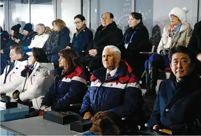  ?? AP Photo/Patrick Semansky, Pool ?? ■ Vice President Mike Pence, second from bottom right, sits between second lady Karen Pence, third from from bottom left, and Japanese Prime Minister Shinzo Abe at the opening ceremony of the 2018 Winter Olympics Friday in Pyeongchan­g, South Korea....