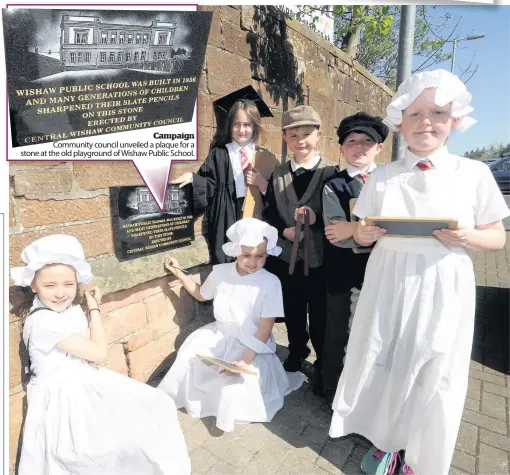  ??  ?? Campaign Community council unveiled a plaque for a stone at the old playground of Wishaw Public School. Step back in time Children from Wishaw primary schools dress up like how they used to be at Wishaw Public School