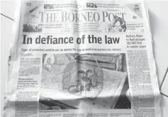  ??  ?? Photo shows the front page report for The Borneo Post on Oct 17.