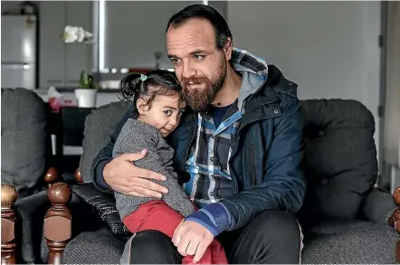  ?? CHRIS SKELTON/STUFF ?? Hisham Al Zarzour with his daughter Ruaa, 3. Hisham was shot in the hip and legs at Al Noor mosque on March 15, but because he was a casual worker he was told he was not eligible for ACC salary cover.